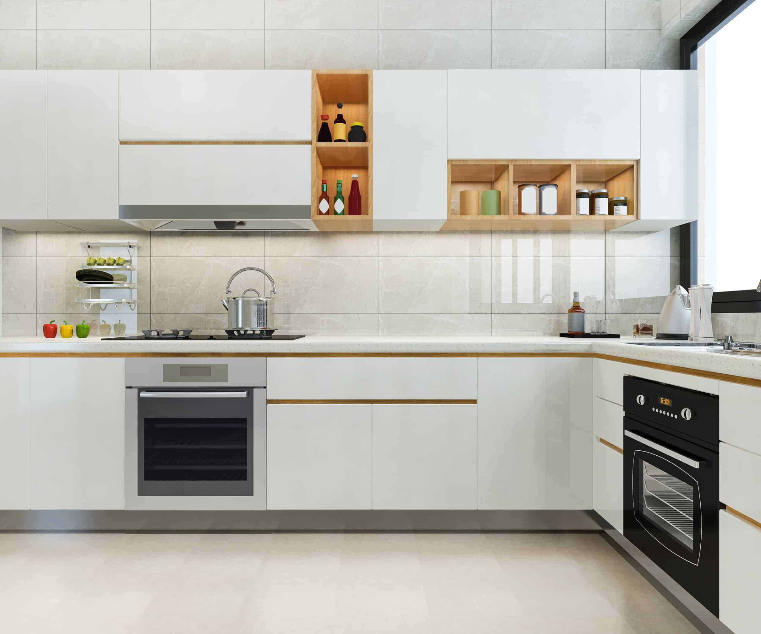Modern modular kitchen design in Ghana with white cabinets, built-in oven, open wooden shelves, and minimalist decor by Euro Homes Interior.