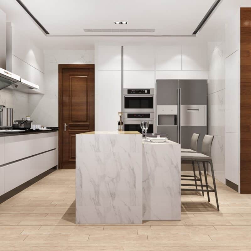 Modern custom kitchen with white high-gloss cabinets, marble island, built-in stainless steel appliances, wooden accents, and minimalist bar seating—designed for functionality and elegance
